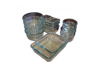 Assortment Of Pyrex Glass Dishes In Various Sizes