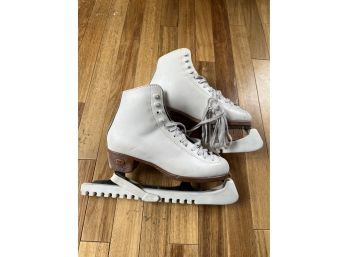 White Riedell Ice Skates With Blade Covers