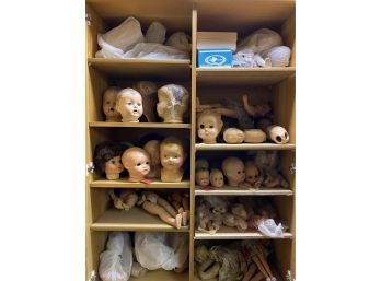 Cabinet Full Of Doll Heads And Doll Parts