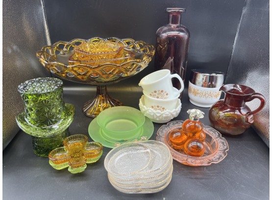 Assortment Of Colorful, Cups, Trays, Disks, And Display Bowls