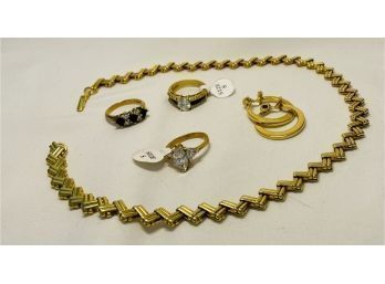 Three Beautiful Rings, Clip Earrings, And A Gold Tone Necklace