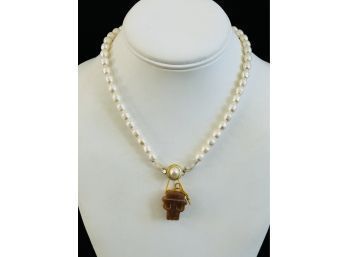 White Pearl Necklace With Monkey Head Pendant Attached