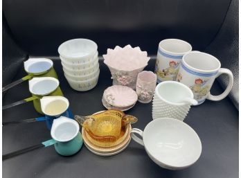 Assortment Of Mugs, Coasters, Handled Pitchers, And Tea Cups