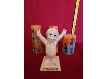 Peace Statue With Candles