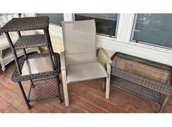 Trio Of Wicker Tables And A Patio Chair