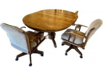 Oval Oak Table And 4 Cushioned Adjustable Chairs