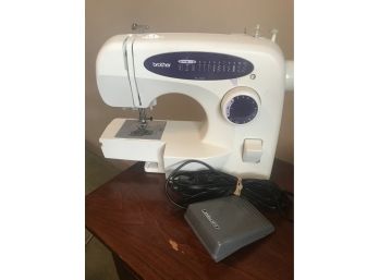 Brother Sewing Machine And Box Of Sew Supplies