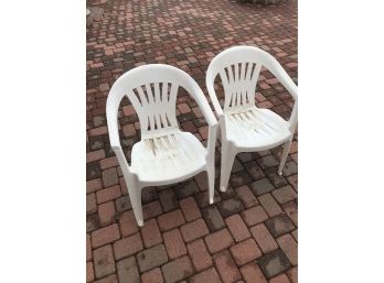 Two Outdoor Plastic Chairs          PF