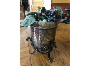 Glass Vase With Rod Iron Stand Filled With Plastic Grapes