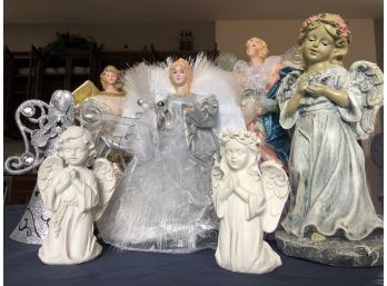 Angel Statues And Angel Tree Toppers. (R)