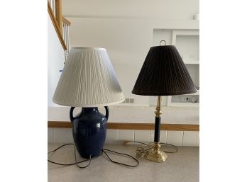 Two Table Lamps. One Is Blue With A White Shade And One With Black/gold Accents.