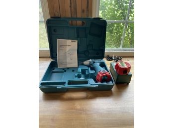 Makita Cordless Impact Driver In Carrying Case. Extra Battery And Plug In Charge Included.