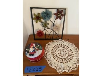 Various Items Including A Metal Flower Picture, Tins And Knitted Placemat.