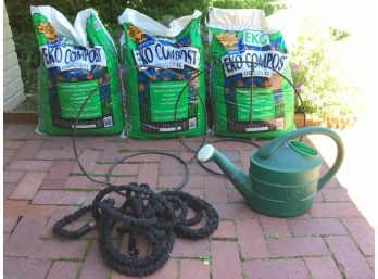 Outdoor Garden Lot. 3 Largs Bags Of Eko Compost, 2 Metal Plant Hangers, Water Pale. BLACK HOSE NOT INCLUDED