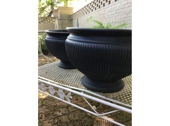 Two Medium-large Black Plastic Pots For Outdoor Use.