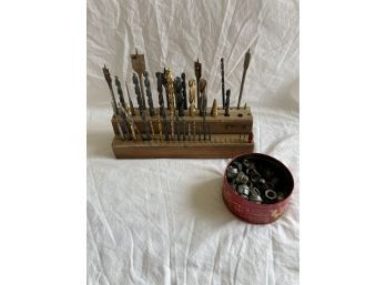Assortment Of Drillbit Heads Ranging In Sizes And Variety Of Bolts.