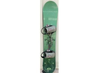 Green Burton Snowboard With Floral Designs.