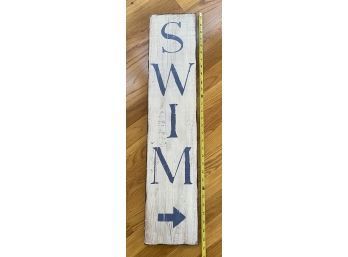 Tall Wooden Art Piece From Home Goods With SWIM Written On It