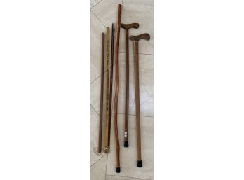 Two Wood Canes And Walking Stick. Canes Stand Three Feet Tall, Brand Unknown.