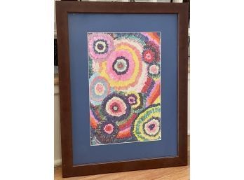 Playful Color Swirl Artwork In A Brown Frame.