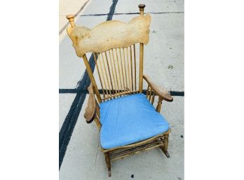 Wooden Rocking Chair With Blue Seat Cushion