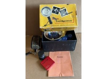 Vintage KODAK Accessories Including Flash Kit, Lens Cap, And Camera Strap