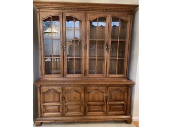 Gorgeous Wooden Cabinet With Glass Doors And Lots Of Storage.