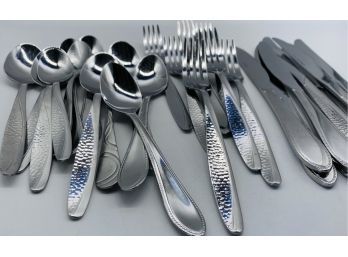 Two Sets Of Silverware