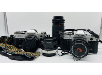 TWO Vintage CANON FILM CAMERAS With Two Extra Lenses, Camera Bag, And Accessories!