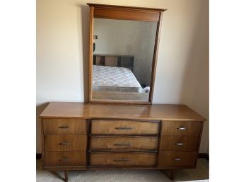 Beautiful Wooden Dresser With Mirror Attached.