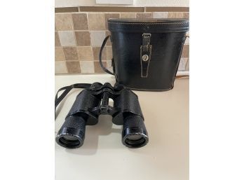 Pair Of Binoculars In A Carrying Case