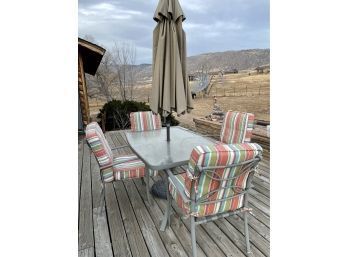 Lovely Outdoor Patio Set. Glass Table, Six Chairs, And An Umbrella!