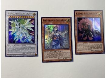 Yu-gi-oh! 1st Edition Stardust Sifr Divine Dragon, Priestess With Eyes Of Blue, And Kozmo Scaredy Lion.