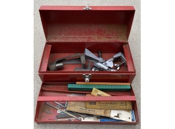 Red Toolbox With Miscellaneous Tools Inside