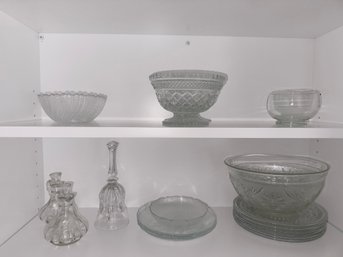 Two Shelves Of Kitchenware Glass