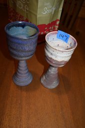 147  PAIR POTTERY GLASSES