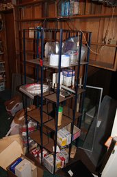 207  SPINNING STORAGE RACK W CONTENTS