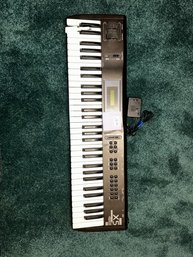 180 - KORG X5 SYNTHESIZER- HAS A BROKEN KEY