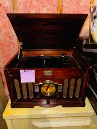 127 -  AM FM RADIO TURNTABLE AND CASSETTE PLAYER - UNTESTED