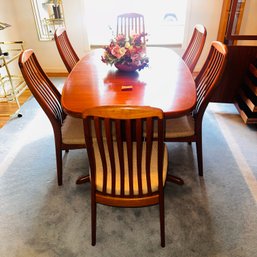 017 - DANISH TEAK DINING TABLE WITH TWO LEAVES AND SIX CHAIRS