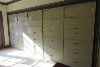 125 - LARGE LOT OF FILE CABINETS