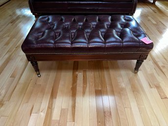 116 -LEATHER TUFTED OTTOMAN