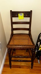 048 - ANTIQUE CANE BABY'S HIGH CHAIR