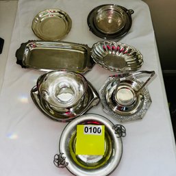 100 - STAINLESS PLATTERS AND BOWLS