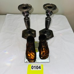 104 - BRONZE SHOES AND CANDLE STICKS