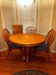 140 - TABLE WITH THREE CHAIRS AND LEAF