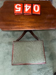 Lot 045 - TABLE AND FOOT REST STOOL