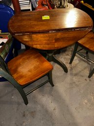 120 -  DROP LEAF TABLE AND TWO CHAIRS