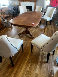 051 -DINING SET ( CHAIRS HAVE EDGE LEATHER WEAR PLEASE SEE PICTURES)