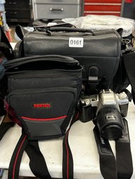 161 - PENTAX ZX-50 CAMERA WITH FRONT BAG ONLY